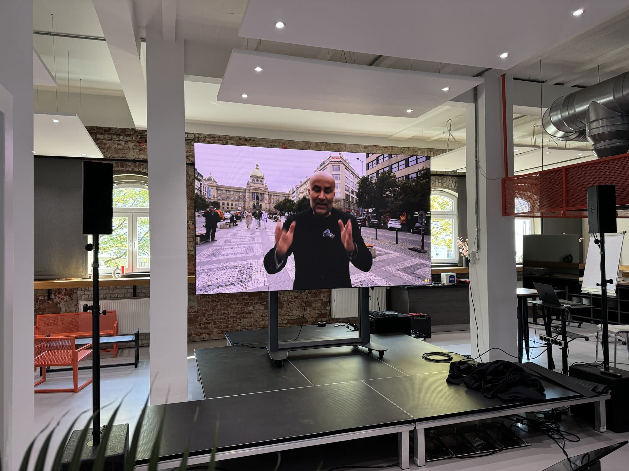 Stage with presentation on a large screen at the REST2RENT event venue in Hamburg